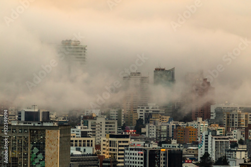 Buildings surrounded by fog