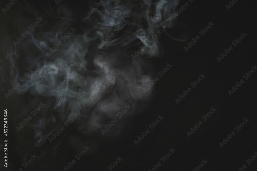 Smoke in the dark. fog on the black background