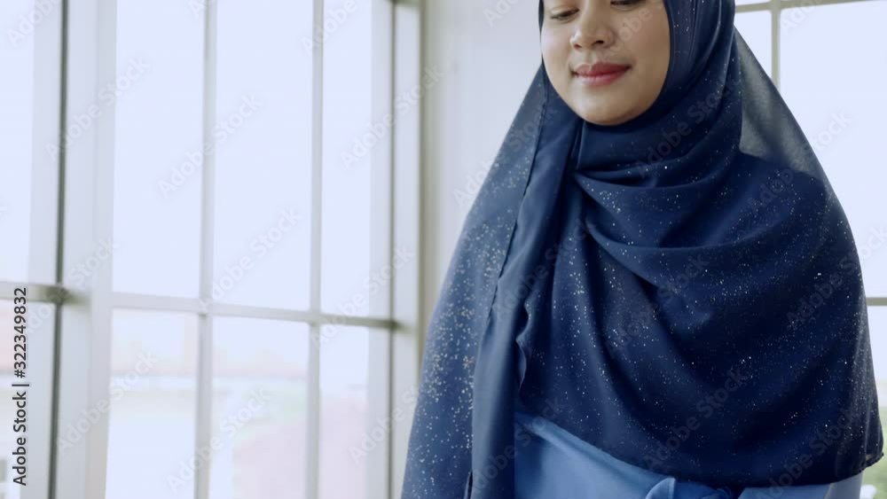 Arab or Muslim women, teenagers are smiling. The smile makes you feel relaxed. Happy life Healthy teeth. Mental health concepts And depression Arab or Muslim women, teenagers are smiling. The smile makes you feel relaxed. Happy life Healthy teeth. Mental health concepts And depression