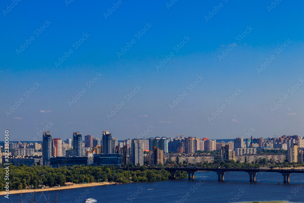 Naklejka premium View of Paton bridge and left bank of the Dnieper river in Kiev, Ukraine