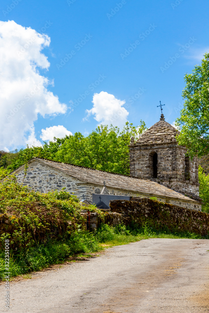 Parish Church of San Esteban in Linares, Province of Lugo, Galicia, Spain on the Way of St. James, Camino de Santiago on a sunny spring day Parish Church of San Esteban in Linares, Province of Lugo, Galicia, Spain on the Way of St. James, Camino de Santiago on a sunny spring day