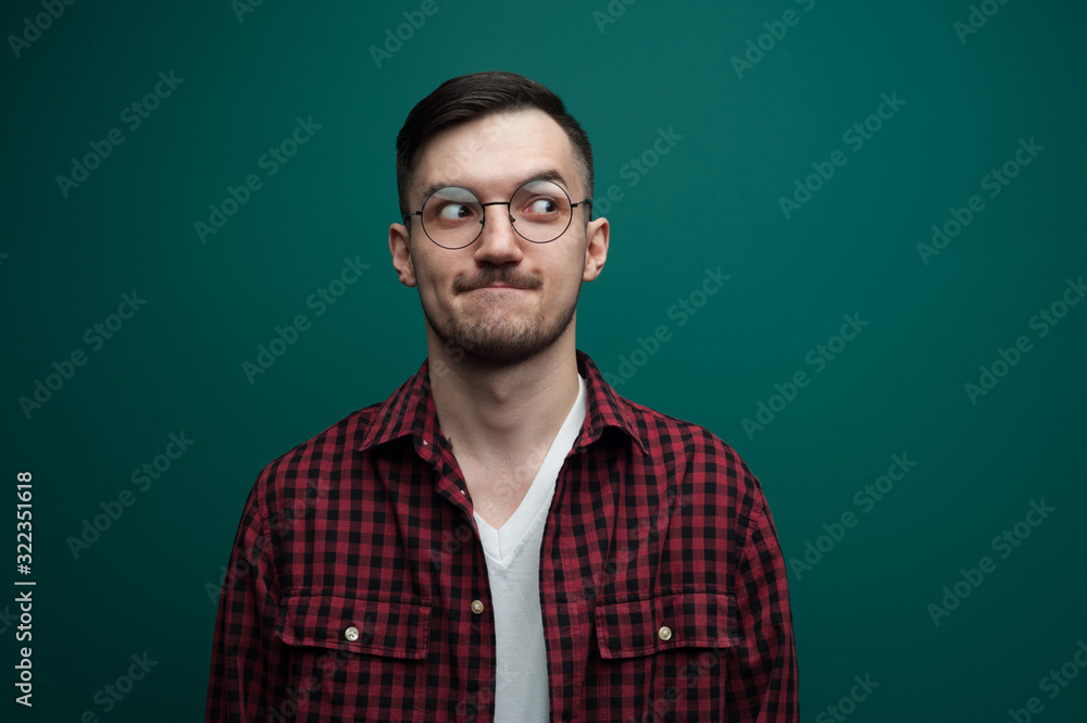 Portrait of a funny young interested man Portrait of a funny young interested man