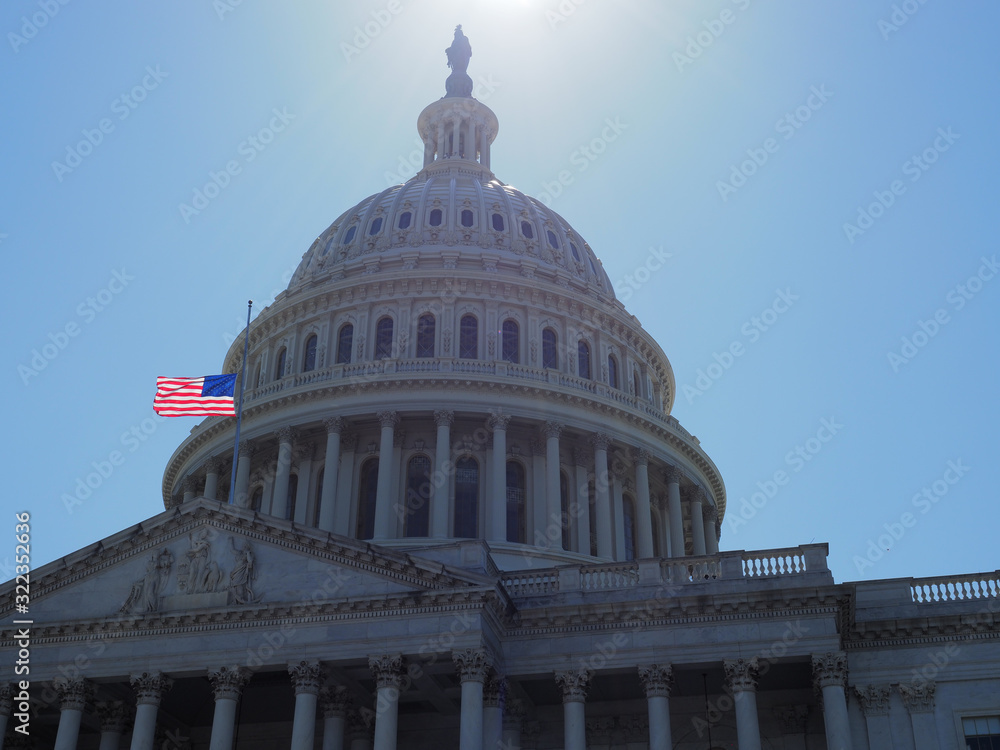 US capitol American flag half-mast.