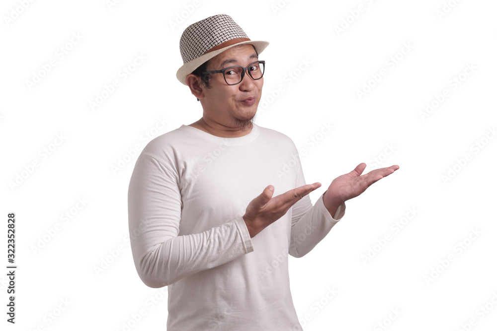 Young Man Showing and Pointing Something on His Side Young Man Showing and Pointing Something on His Side