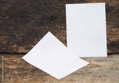blank paper on wooden background, Poster mock-ups paper