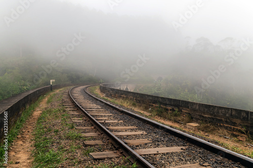Railroad Tracks in the Fog Demodara in Sri Lanka