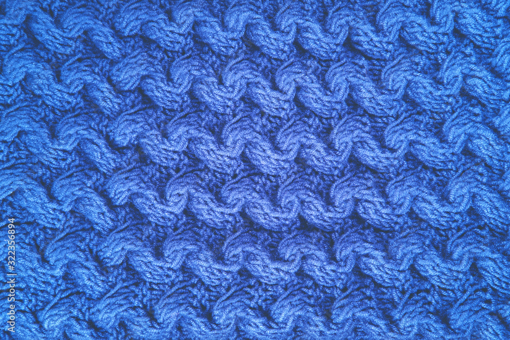 Beautiful wool knitted background in blue color. Beautiful wool knitted background in blue color.