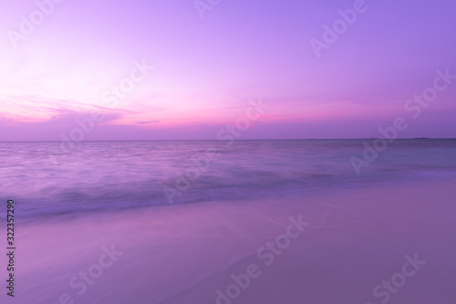 Sea sand sky concept  sunset colors clouds  horizon  horizontal background banner. Inspirational nature landscape  beautiful colors  wonderful scenery of tropical beach. Beach sunset  summer vacation