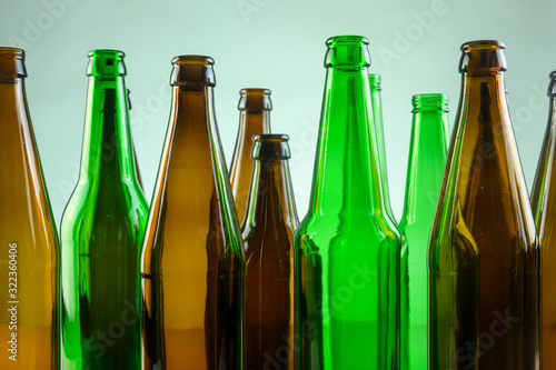 empty beer bottles stand on a white background