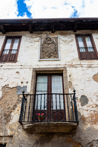 Partial low-angle view of an old house in Ponferrada, Province of Leon, Castile and Leon, Spain on the Way of St. James © Stanislava