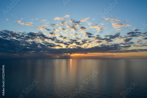 Tramonto dall'isola d'Elba sulla Corsica. Punta Nera. Toscana, Italia photo