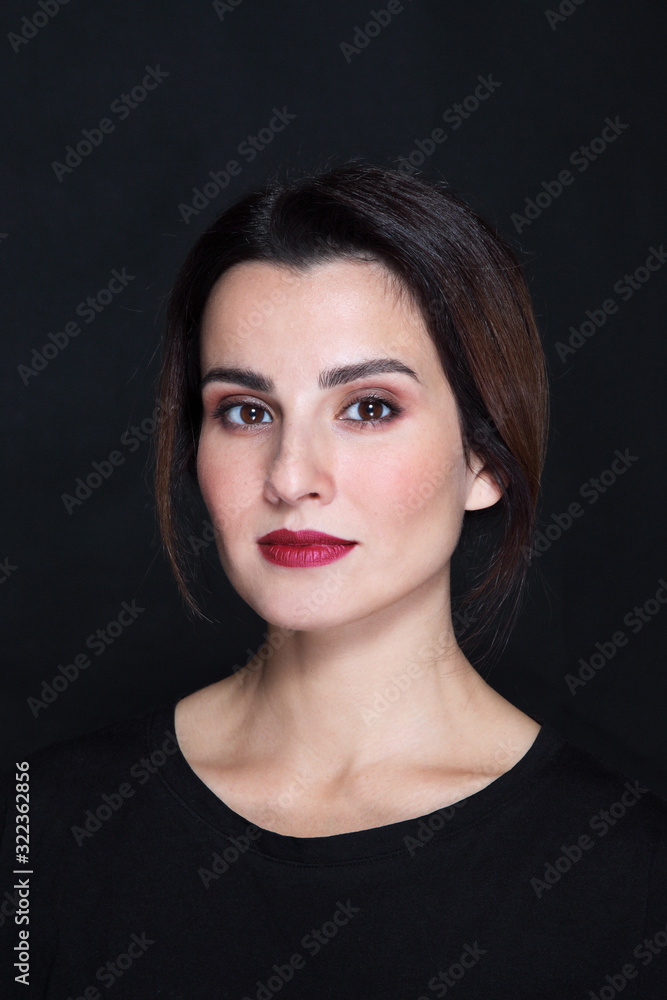 Portrait of young beautiful brunette with wine red lipstick Portrait of young beautiful brunette with wine red lipstick