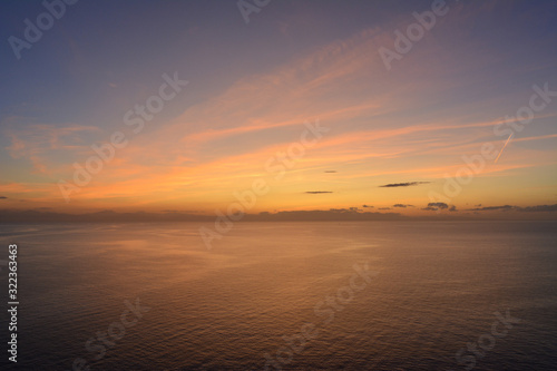 Tramonto visto dall'isola d'Elba sulla Corsica. Punta Nera. Toscana, Italia © Renzo