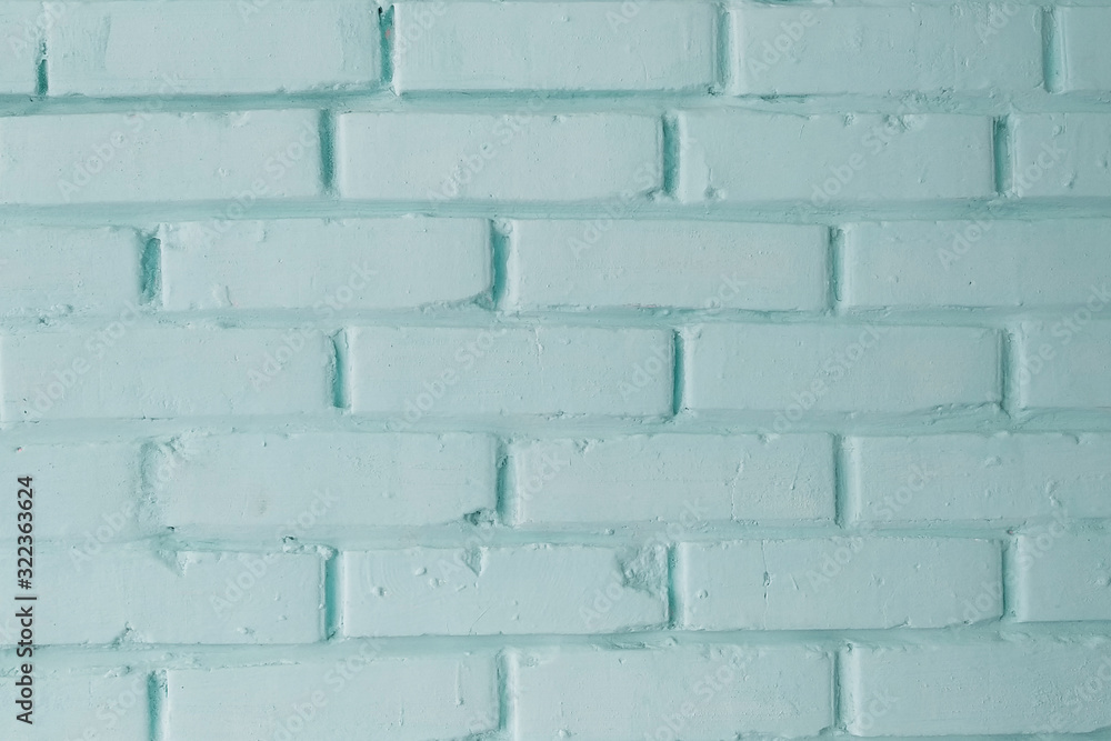 Obraz premium Texture of a brick wall, whitewashed with white paint. Structure.