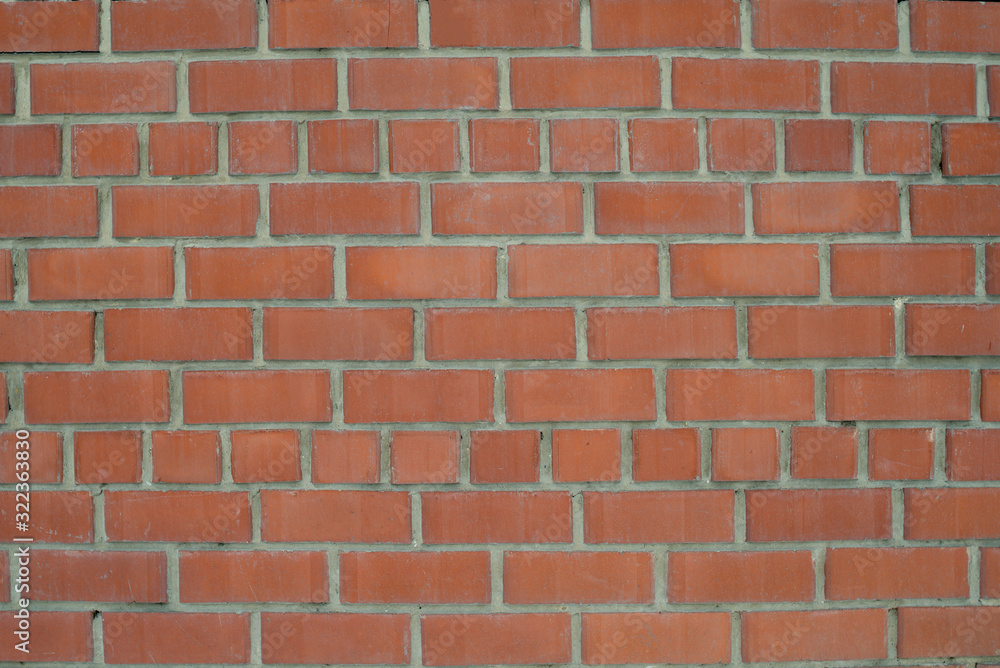 Fototapeta premium The texture of the brickwork of red brick. Structure, part of the wall.