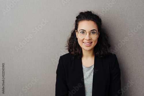 Smiling friendly young professional woman © contrastwerkstatt