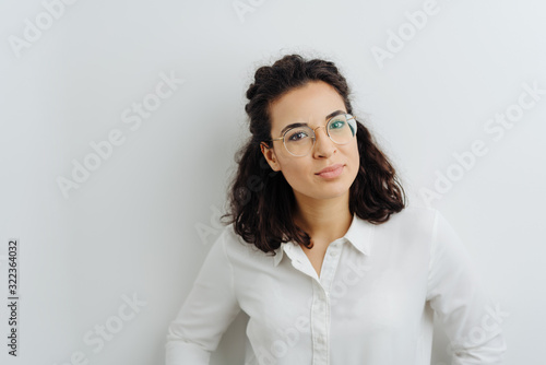 Fototapeta Attractive brunette in white blouse portrait
