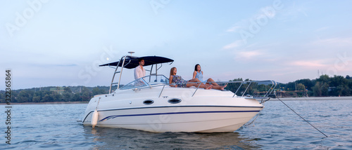 Friends enjoying on the boat