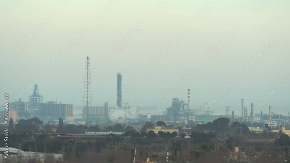 Petrochemical plant, Oil and gas factory at sunset.Suitable for Environment protection and sustainability. Petrochemical plant, Oil and gas factory at sunset.Suitable for Environment protection and sustainability.