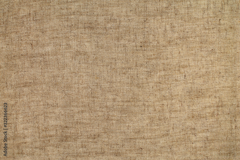 Natural linen material textile canvas texture background Natural linen material textile canvas texture background