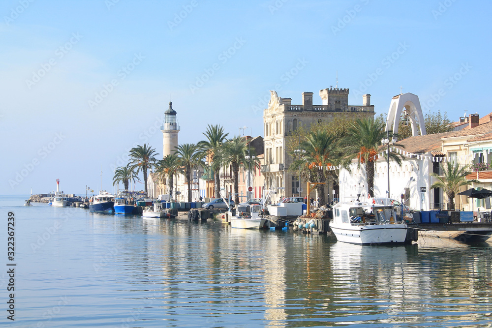 Lighthouse and old fishing port of Grau du roi in Camargue, a resort on the coast of Occitanie region in France
