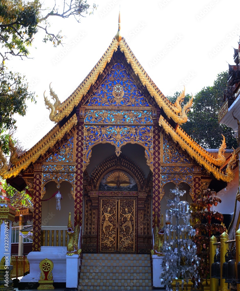 Beautifully decorated facade of Wat Phrathat Doi Southep in Chiangmai Thailand with many Buddha Statues Beautifully decorated facade of Wat Phrathat Doi Southep in Chiangmai Thailand with many Buddha Statues