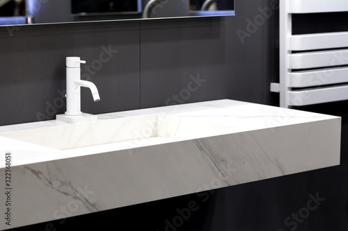 Marble stone sink white bathroom interior.