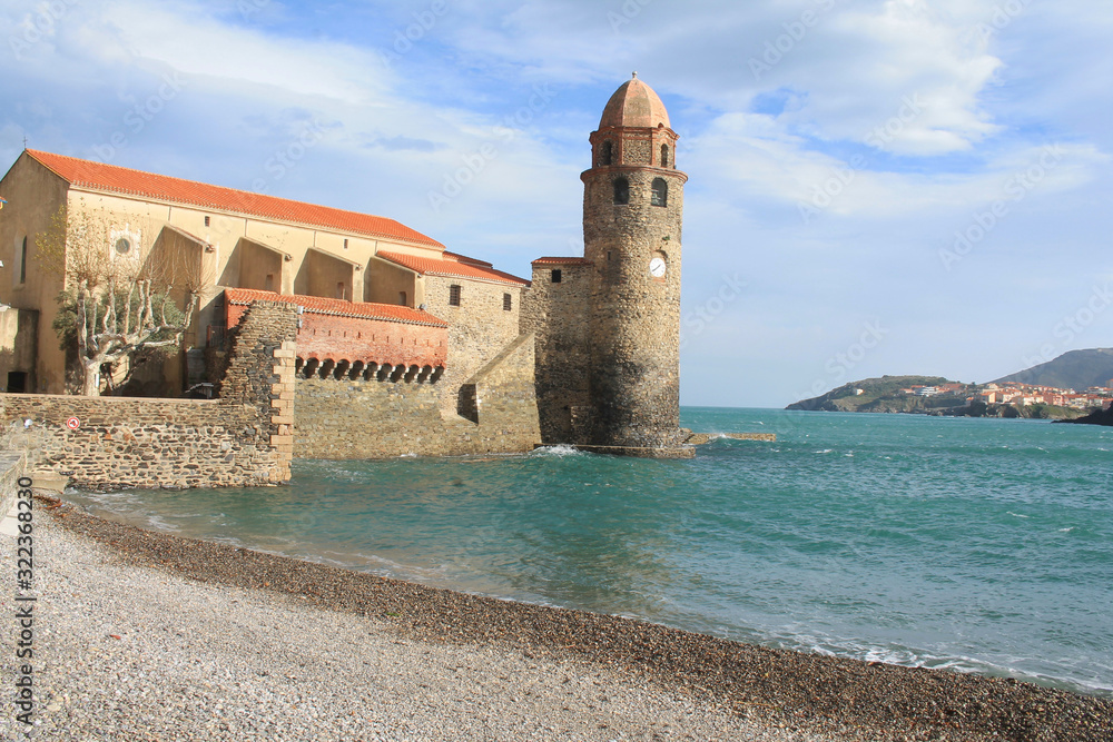 The famous Town of Collioure, in the foothills of the Pyrenees, located in Vermeille coast, the last stretch of the Rousillon coast before the Spanish border The famous Town of Collioure, in the foothills of the Pyrenees, located in Vermeille coast, the last stretch of the Rousillon coast before the Spanish border
