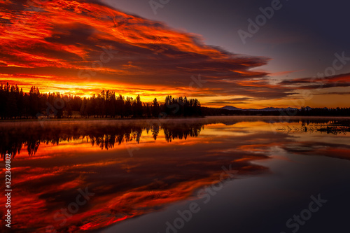 Burning sky, sunrise at the lake. Yellowstone National Park