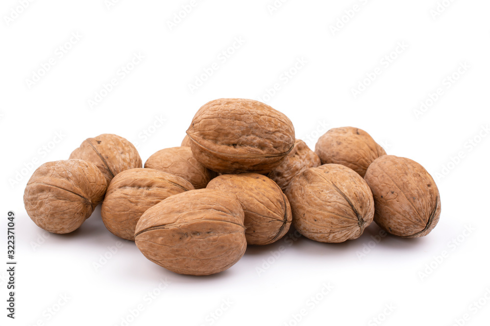 walnuts close up on a white isolated background walnuts close up on a white isolated background