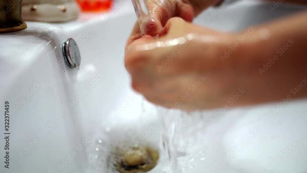 Everyday washing hands with disinfectant soap and warm water under the faucet, killing bacteria and virus, preventing from spread among human population. Epidemic declared, following instructions and Everyday washing hands with disinfectant soap and warm water under the faucet, killing bacteria and virus, preventing from spread among human population. Epidemic declared, following instructions and