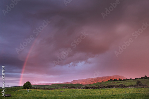 Tongariro National park Rainbow and sunset. New Zealand
