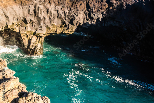 beautiful postcard landscape of Los Hervideros volcanic cliffs with atlantic waves in Lanzarote, Canary Islands, Spain - popular vacation destination