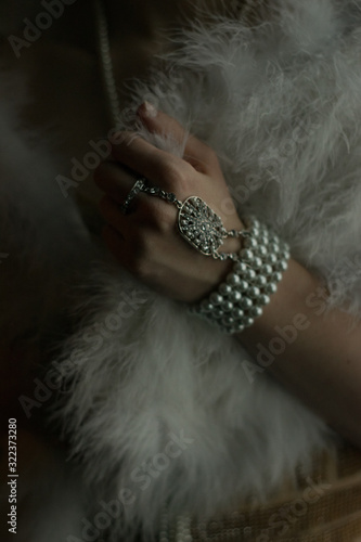 Roaring twenties style concept. Close up view of vintage fashion accessories. 