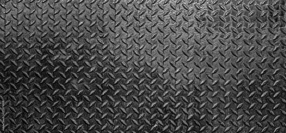 Metal Floor Texture, dark list with rhombus shapes of Black steel texture background Metal Floor Texture, dark list with rhombus shapes of Black steel texture background