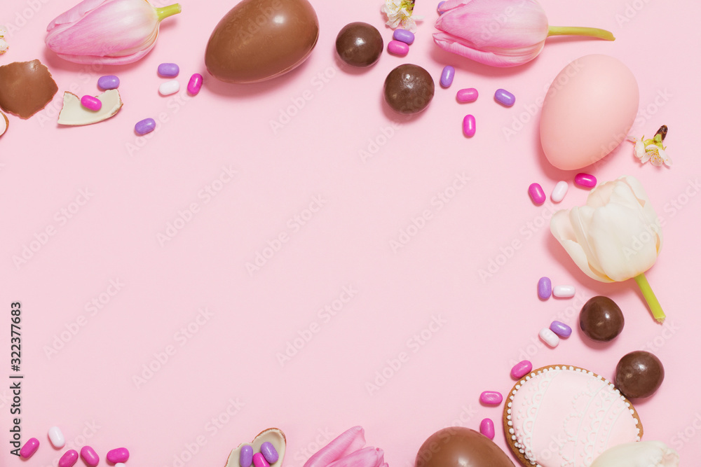 Easter pink background with eggs and flowers Easter pink background with eggs and flowers