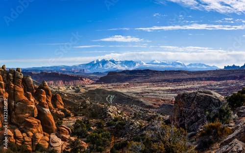 Sunset on the desert at Arches National Park and La Sal Mountains in the background