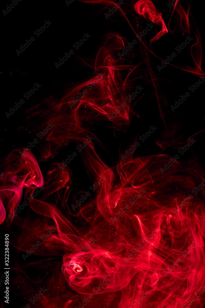 Fototapeta premium Red smoke on black background