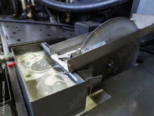 disk type oil skimmer for liquid flood coolant in modern cnc milling machine photo