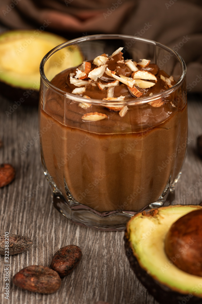 Fototapeta premium Avocado dessert with cocoa.