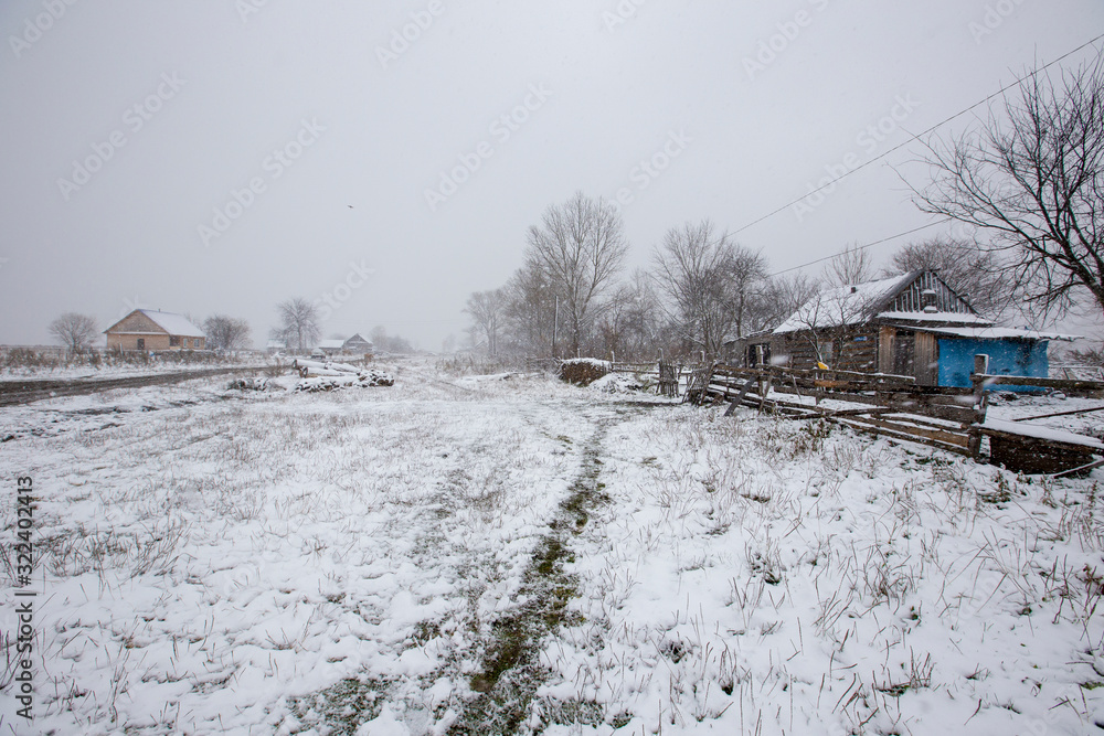 The village of Old Believers from Latin America in Russia in the Primorsky Territory. General view of an Old Believer authentic village in the outback of Russia in snowfall.