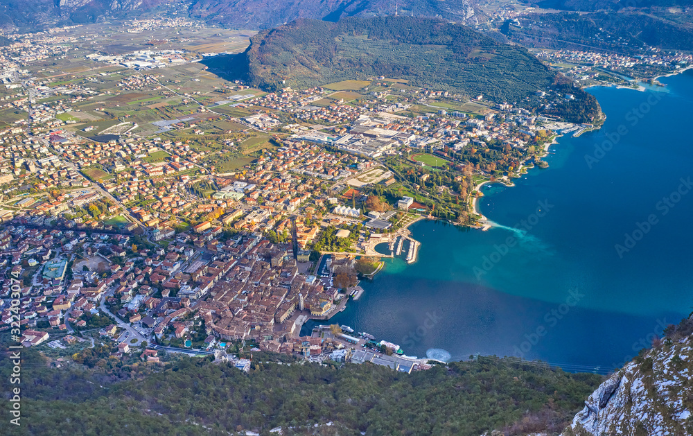 Fototapeta premium Panoramic view of the beautiful Lake Garda .Riva del Garda town and Garda lake in the autumn time , Trentino Alto Adige region,Italy