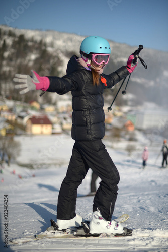 child on ski