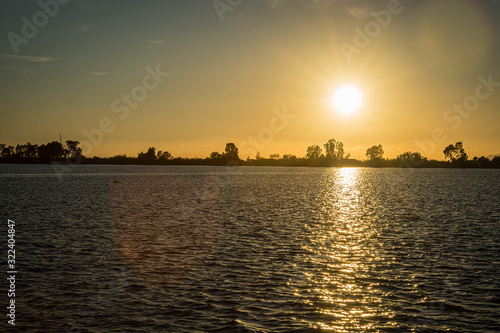 Sunset at the lakes of Messologgi in Greece photo