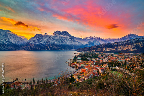 Beautiful Panorama in the Torbole a small town on Lake Garda in the winter time at sunset, Lake Garda surrounded by mountains, Trentino Alto Adige region, Lago di garda, italy