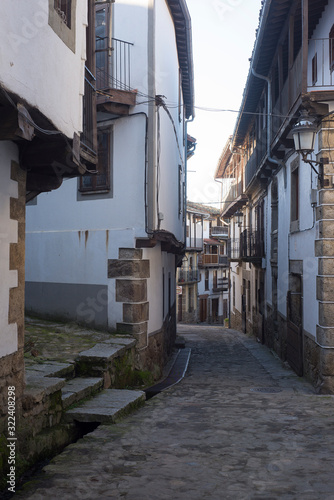 Fototapeta Naklejka Na Ścianę i Meble -  Candelario Salamanca. Street and old houses of the small town next to the mountain of Gredos.