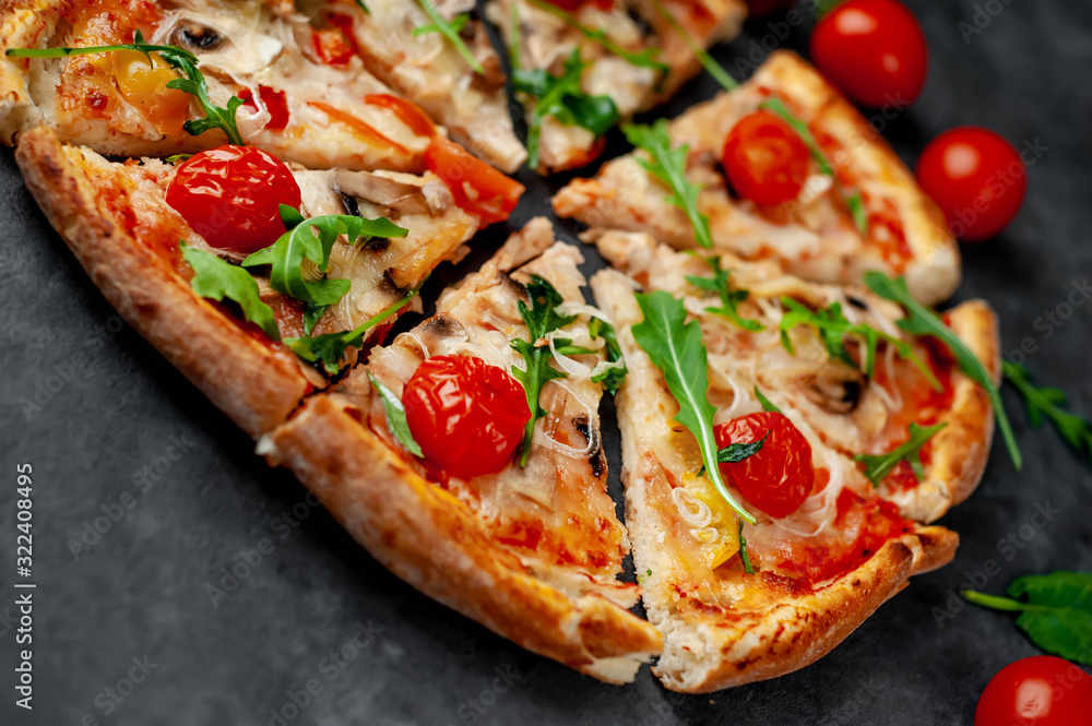 tasty italian pizza with mozzarella cheese, mushrooms, tomato, bell pepper, onion on a stone background tasty italian pizza with mozzarella cheese, mushrooms, tomato, bell pepper, onion on a stone background