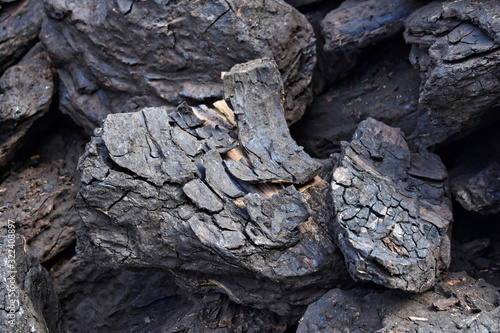 A stack of dry lignite coal ready for heating      