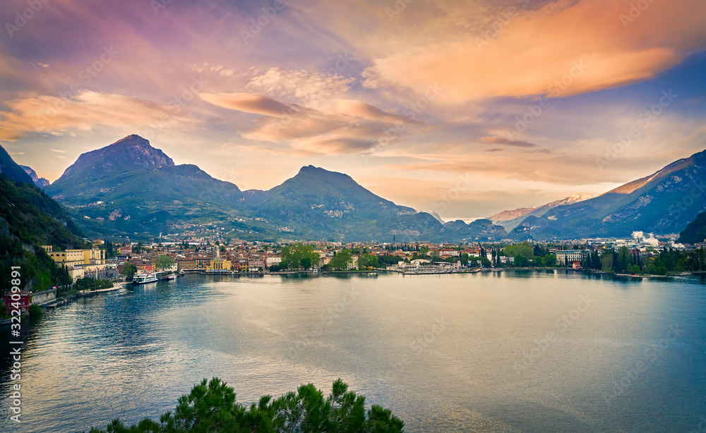 Beautiful landscape. View of Lake Garda and the Ponale trail carved into the rock of the mountain , Riva del Garda,Italy. Popular destinations for travel in Europe