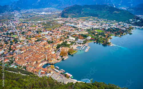 Fototapeta Naklejka Na Ścianę i Meble -  Panoramic view of the beautiful Lake Garda .Riva del Garda town and Garda lake in the autumn time , Trentino Alto Adige region,Italy